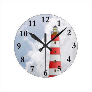 Red Striped Lighthouse in the Clouds Beach Theme Round Clock
