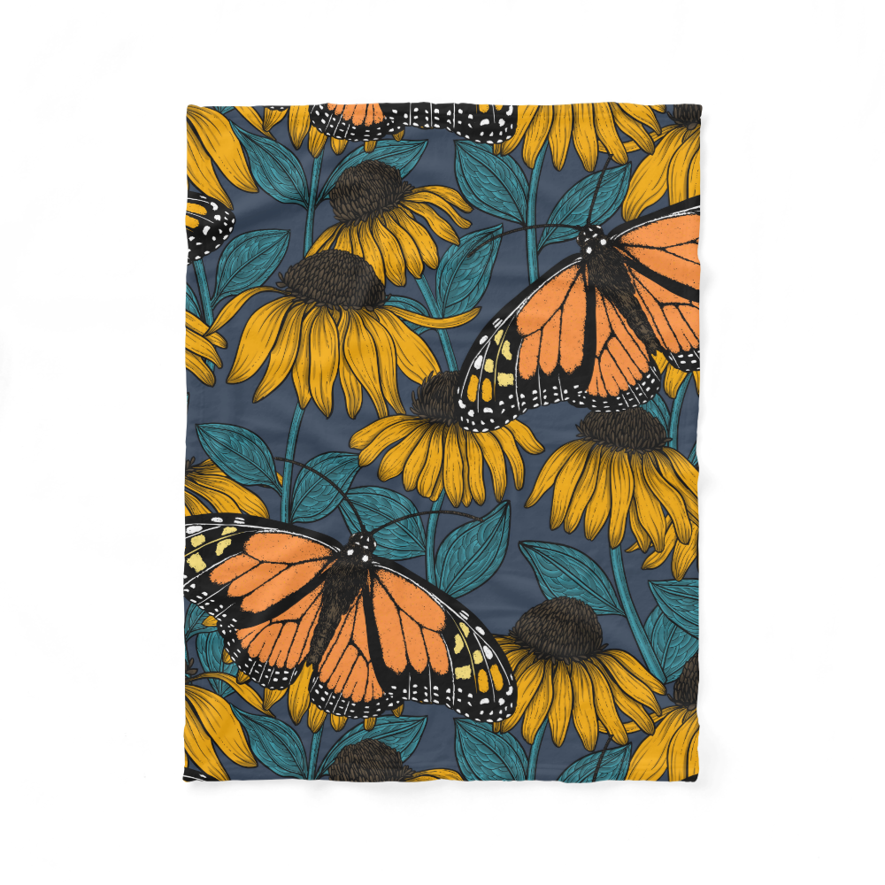 Monarch butterfly on yellow coneflowers fleece blanket
