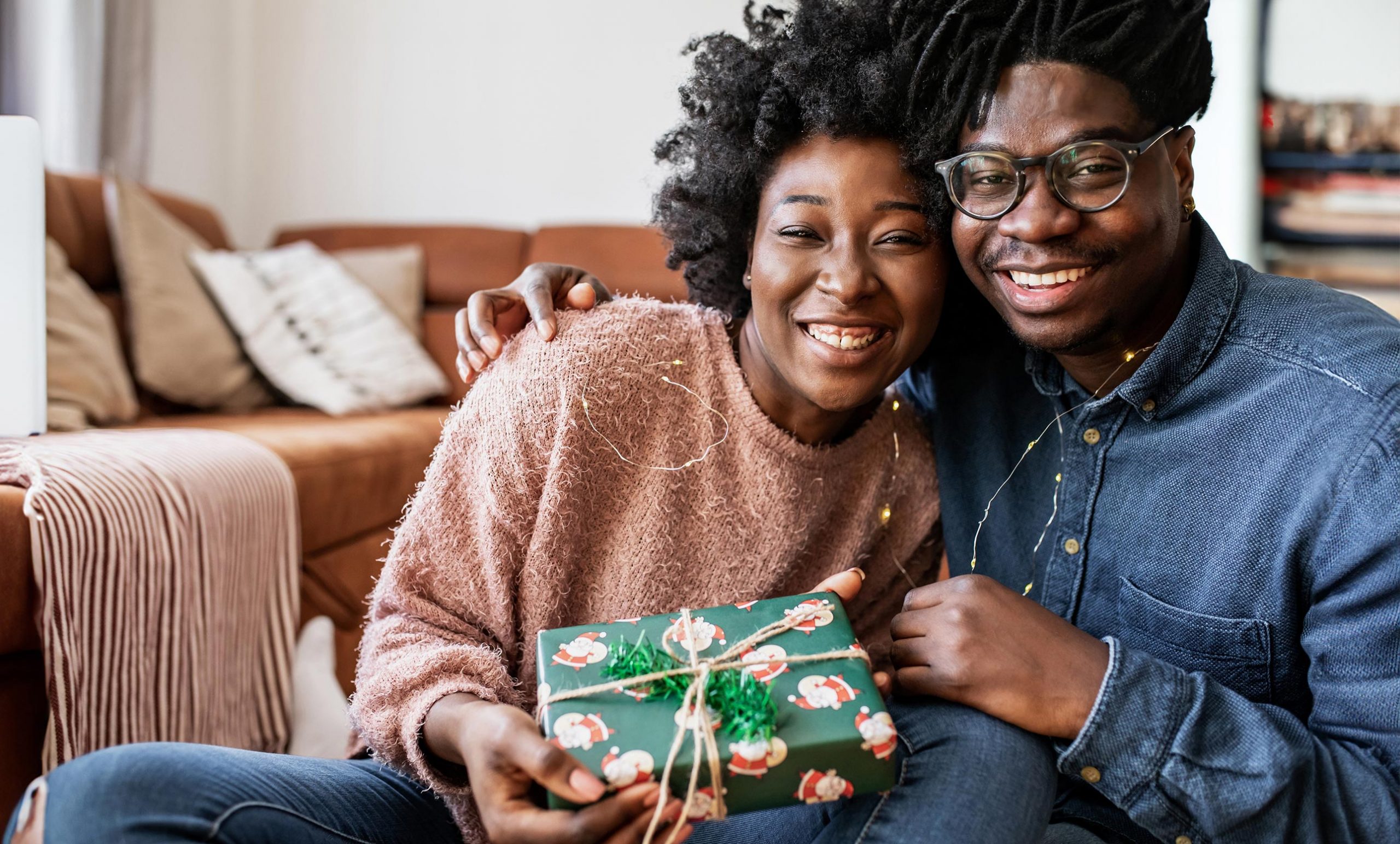 Couple holding present