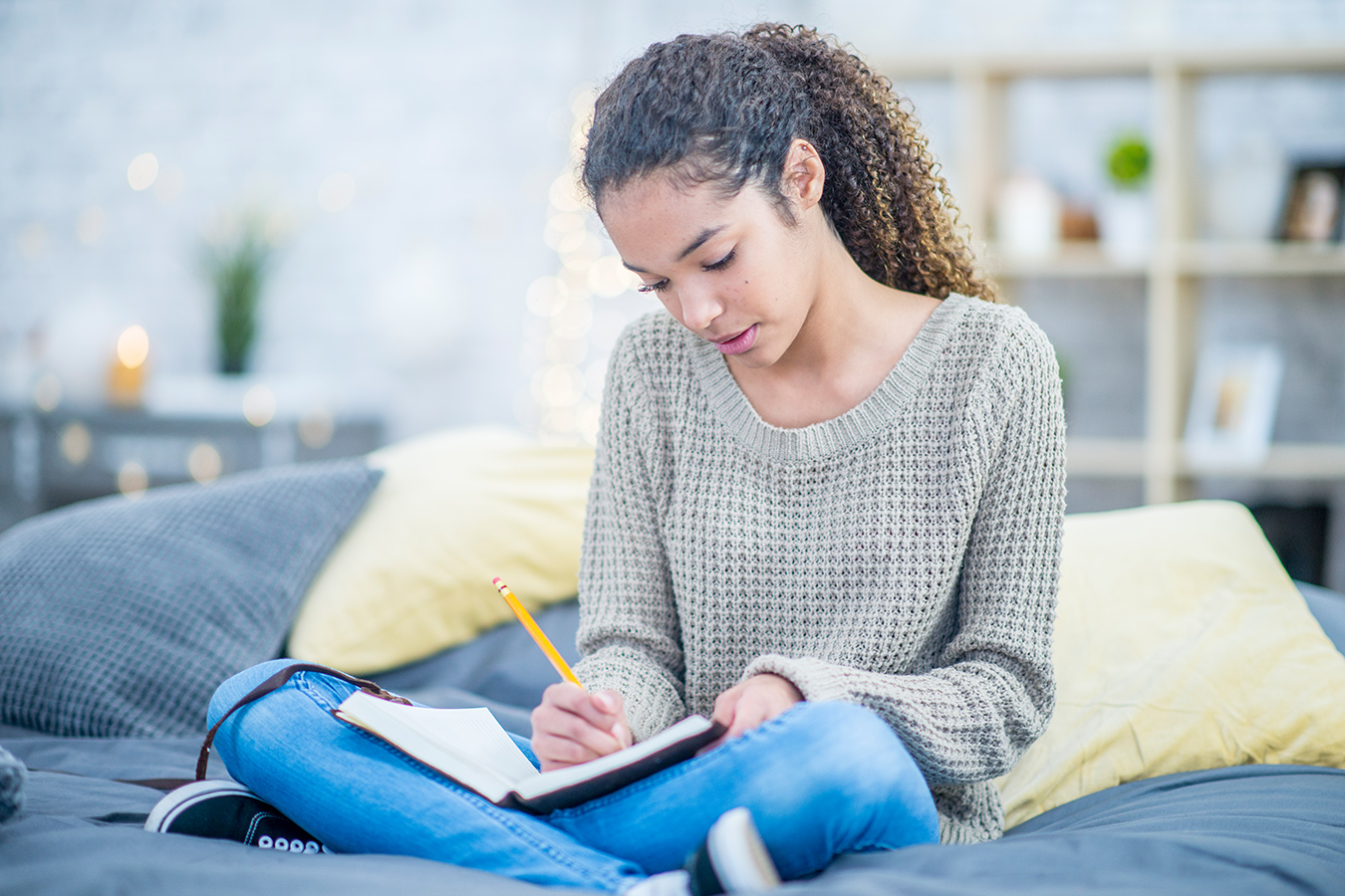 Girl writing in notebook