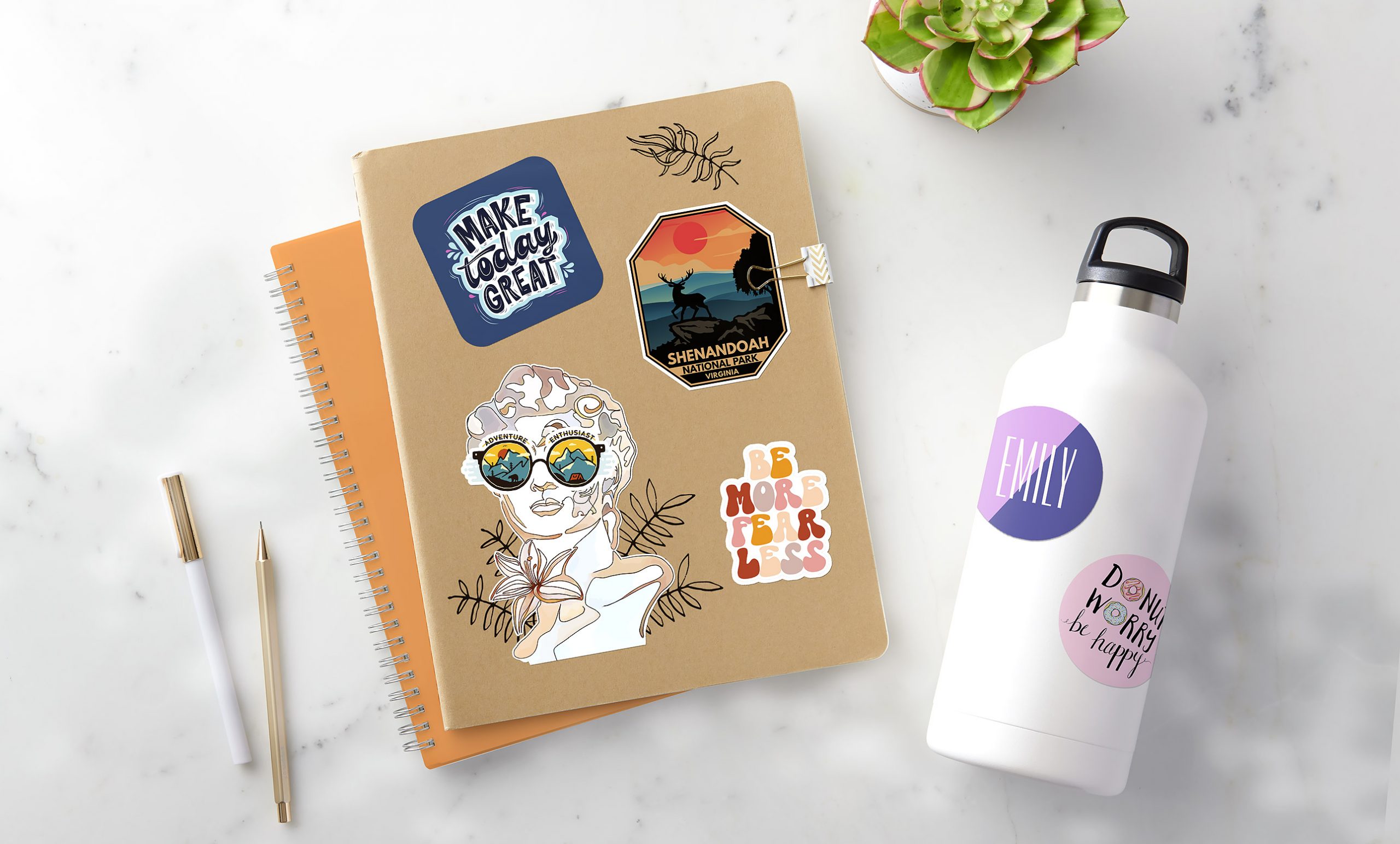 Stickers on notebooks and water bottles