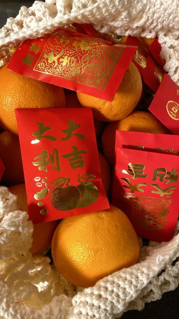 Mandarin Oranges for Prosperity and Red Envelopes to Celebrate Chinese New Year Pin