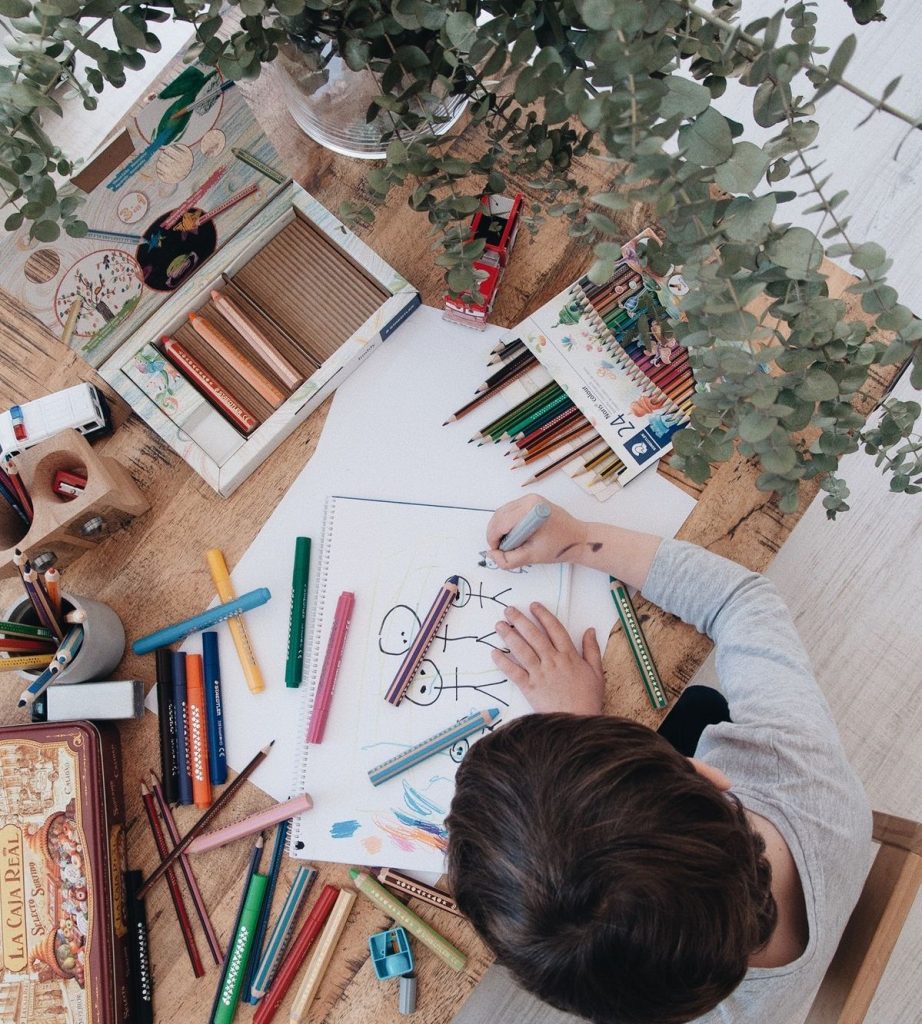 Child Drawing Pictures of The Family for Mother's Day Pin