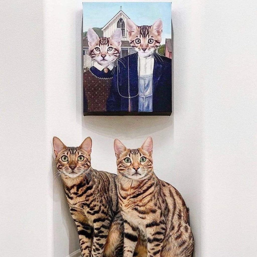 Bengal cats sitting below personalized American Gothic-style pet portrait showing the same cats dressed in classic farmer couple attire.