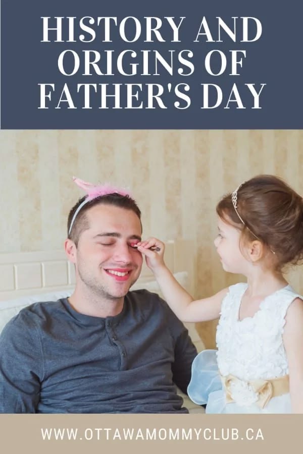 A father wearing a pink fluffy hairband is having makeup applied to his face by a little girl in a dress and tiara. 